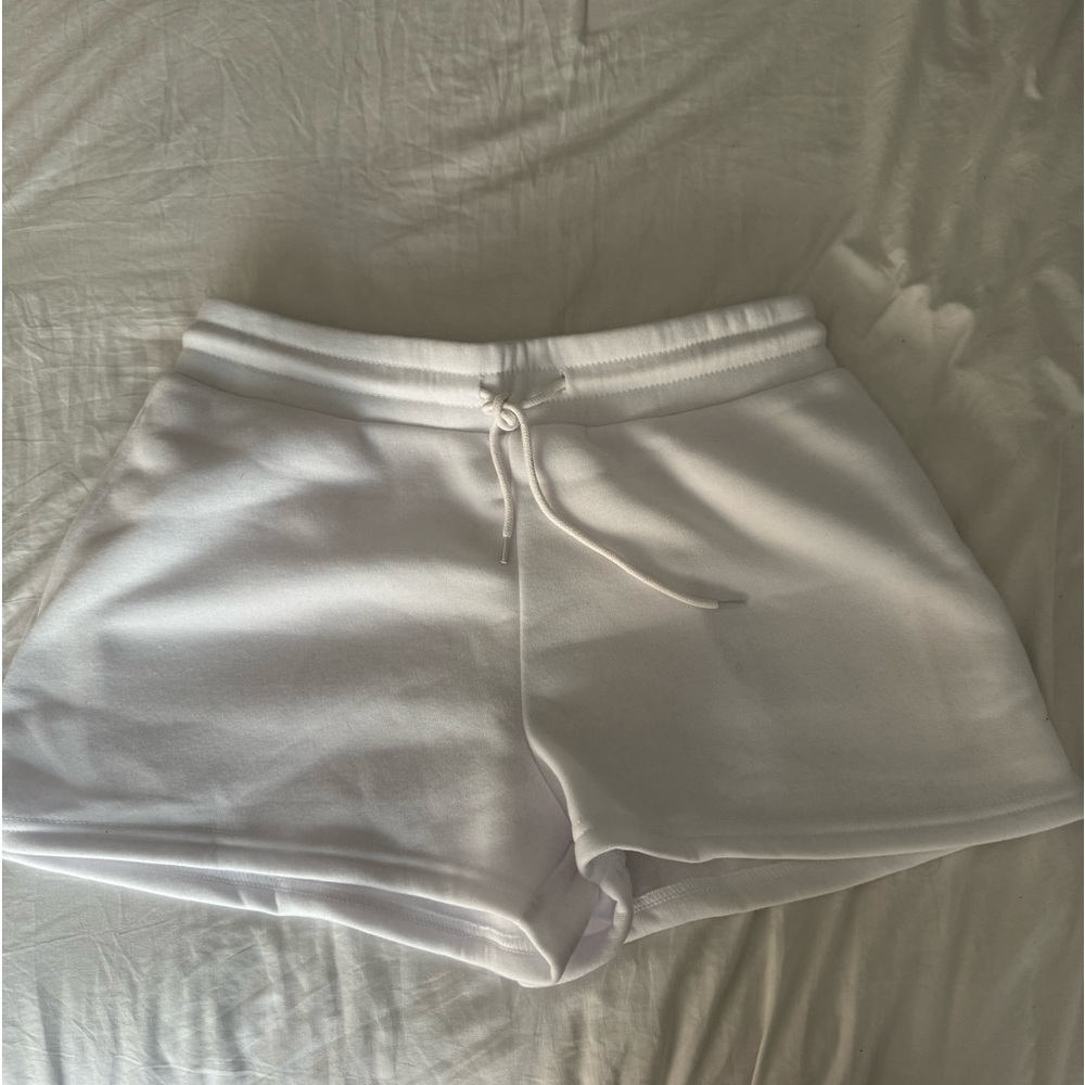 White sweat shorts
